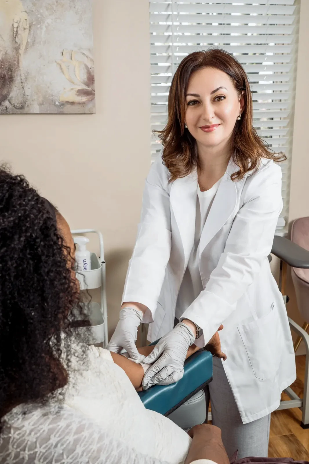 Anna, RN, caring for a client at Ivy Infusions and Wellness