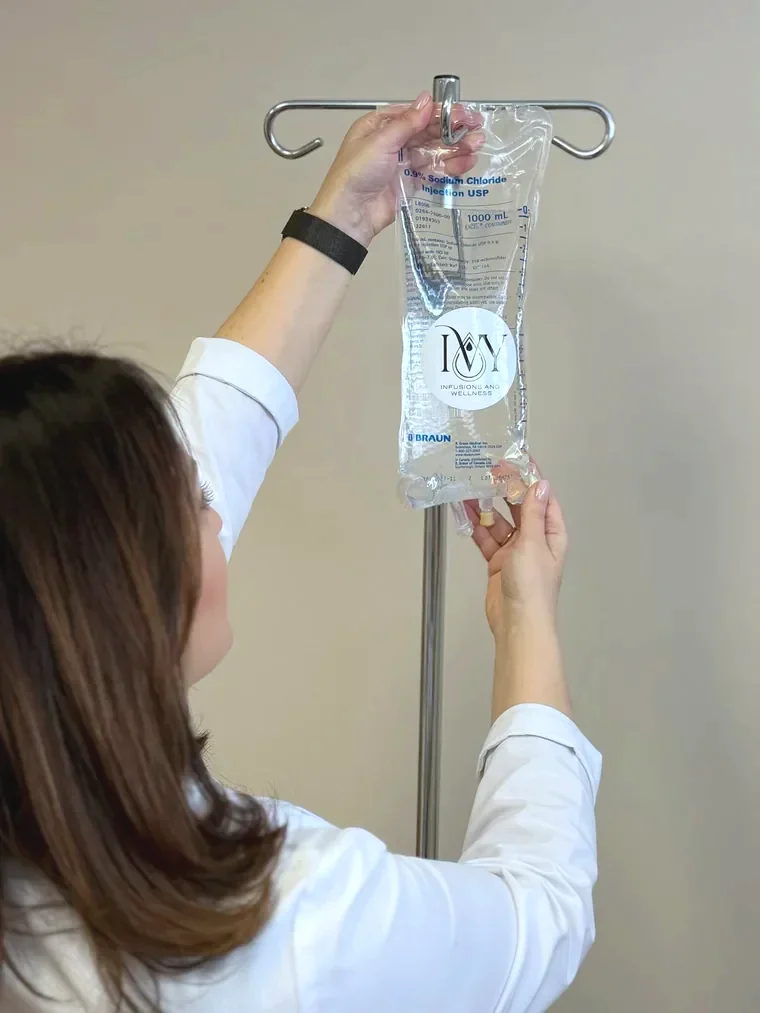An NAD+ infusion bag hung on a stand at the practice